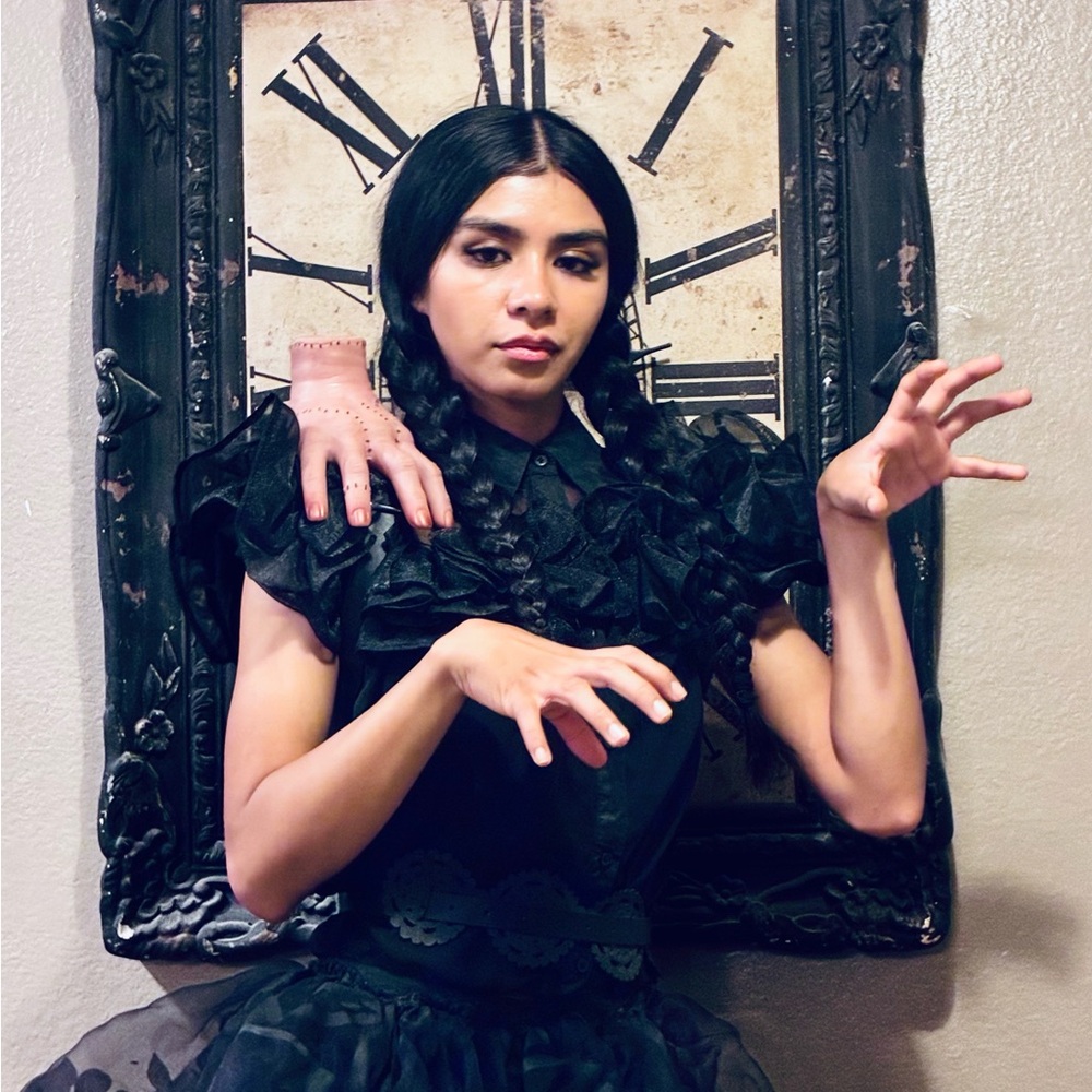 Wednesday Adams Ruffled skirt, top, belt, and hand.